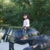 Девочка на ослике в парке г.Хэйхэ